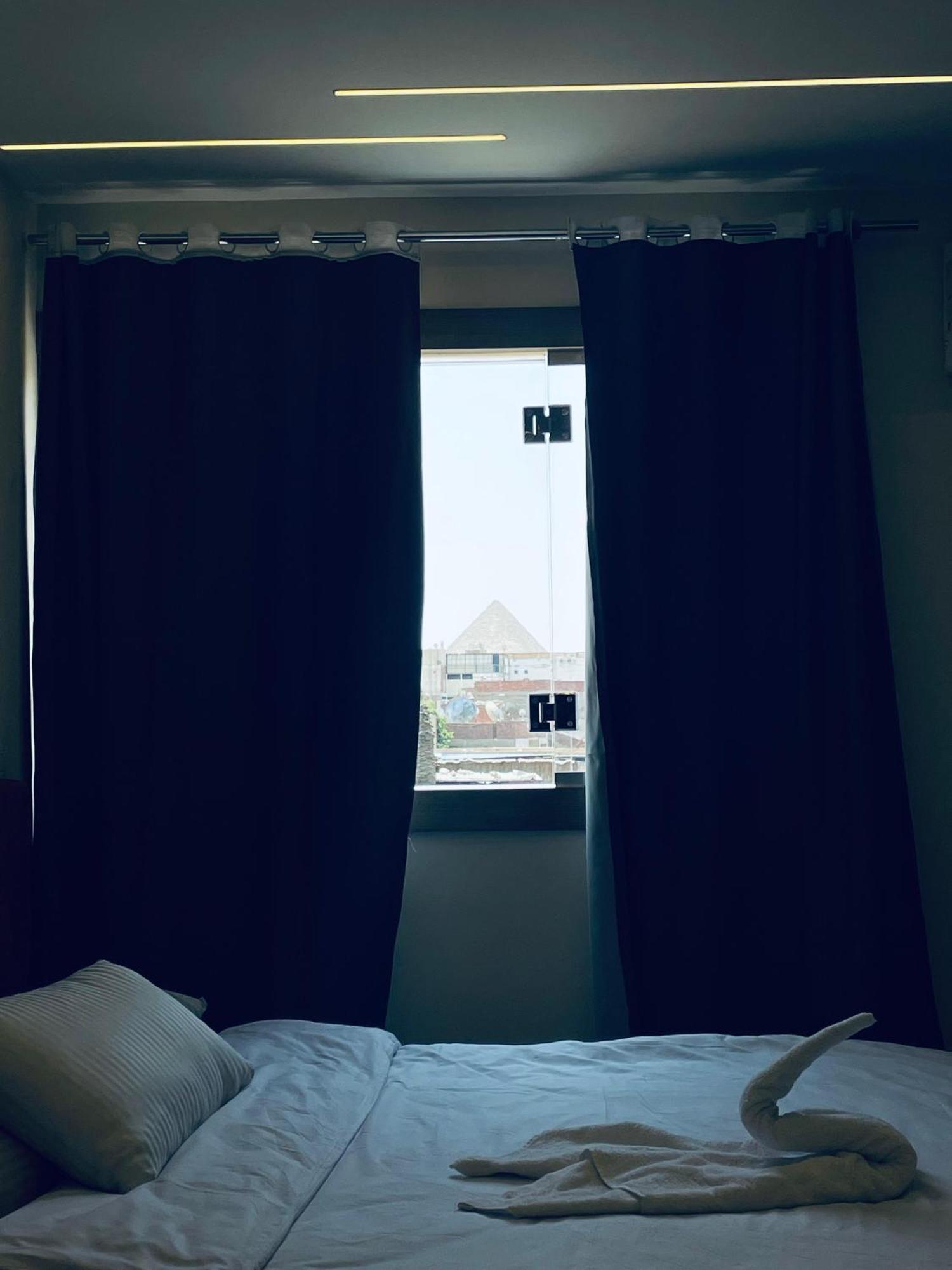 The View Pyramids Hotel Kafret el-Gabal Екстериор снимка